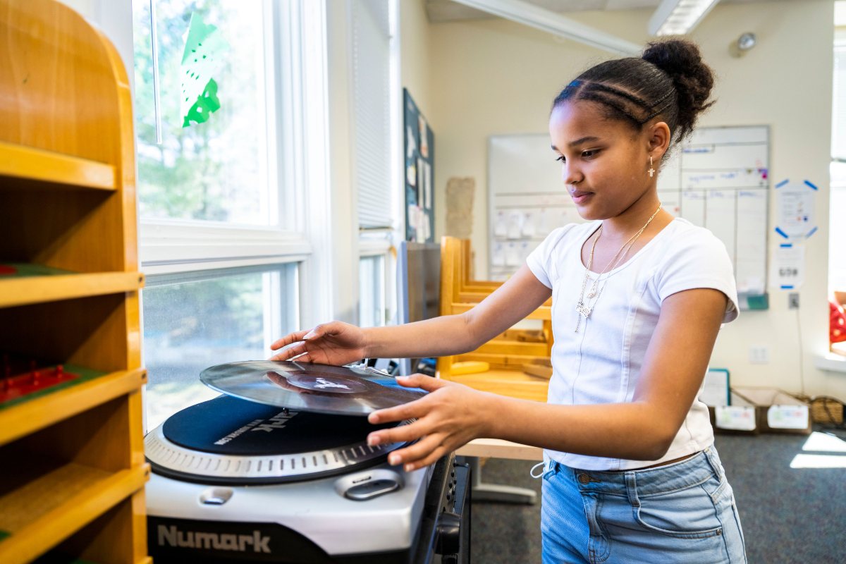 Upper elementary using a vinyl player 
