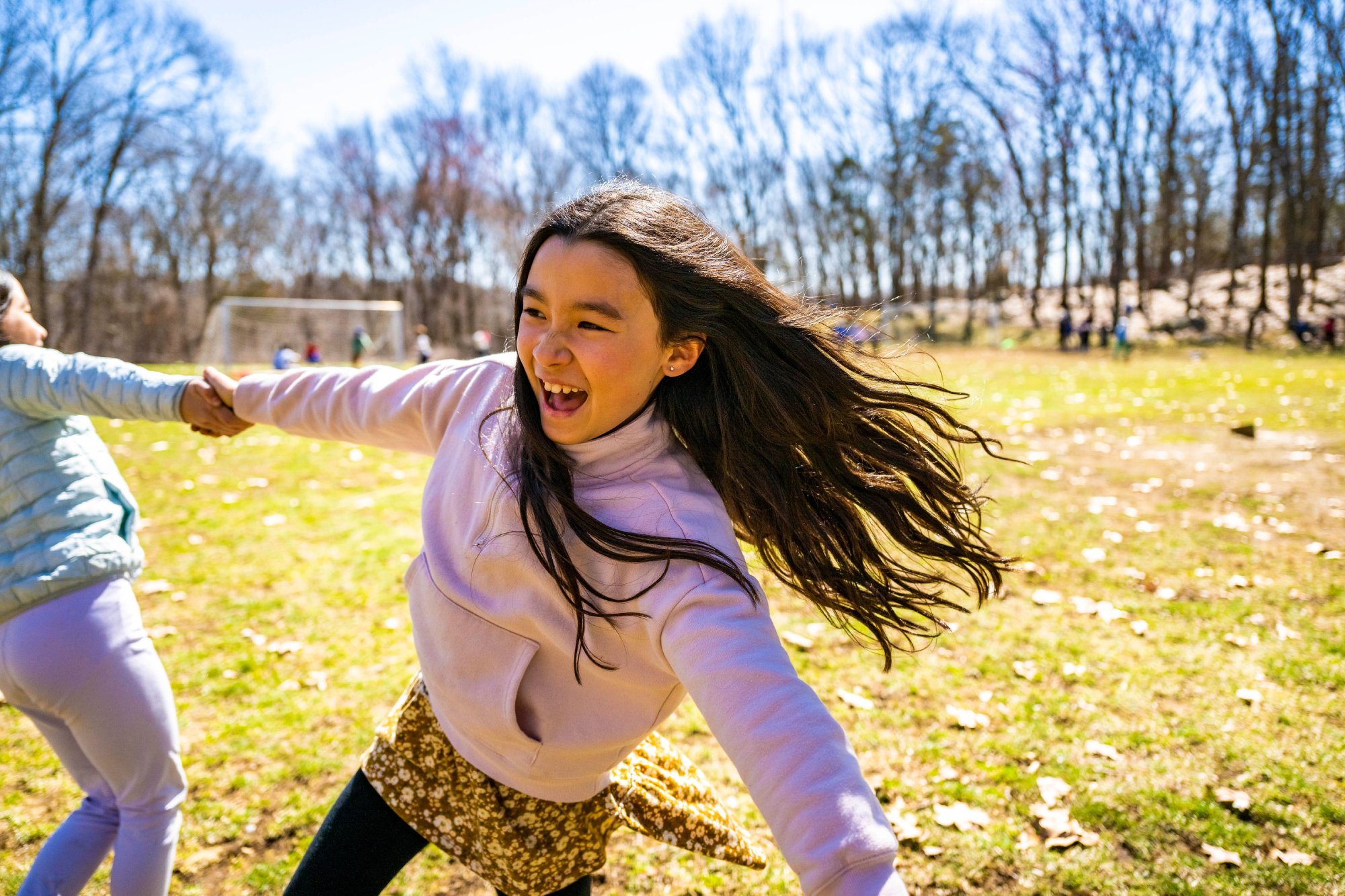 LMS student playing and laughing outside