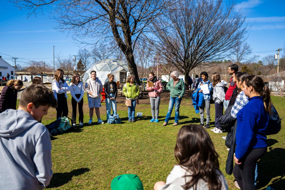 LMS students gathered in a circle for daily routines