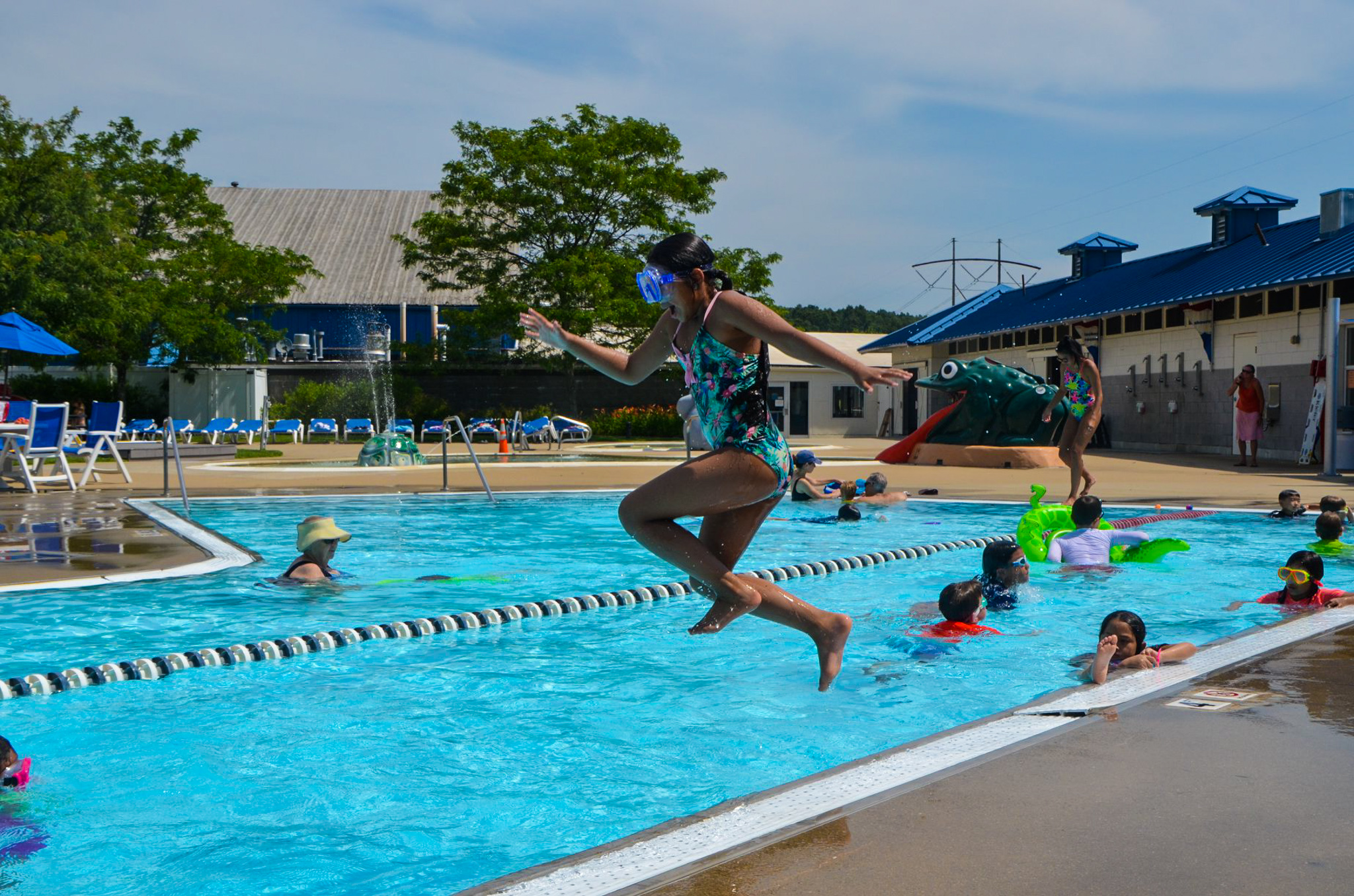 Children jumping and playing in a pool as part of Horizons@LMS activities